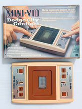 Cargar imagen en el visor de la galería, Mini-Vid Dodge City Gunfight - Handheld Electronic Game - Vintage - Boxed
