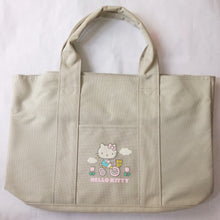 Load image into Gallery viewer, Hello Kitty Ride a Bike Tote Bag
